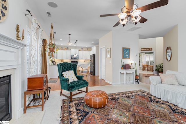 living room featuring ceiling fan