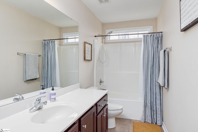 full bathroom with shower / bath combination with curtain, tile patterned floors, toilet, and vanity