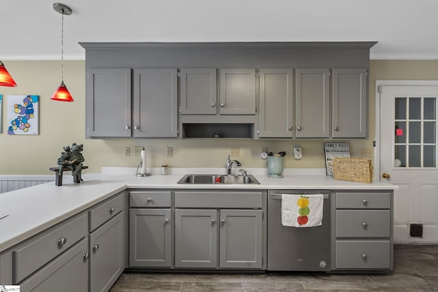 kitchen featuring pendant lighting, sink, crown molding, dishwasher, and gray cabinetry