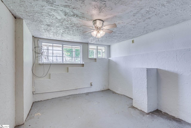 spare room featuring a textured ceiling