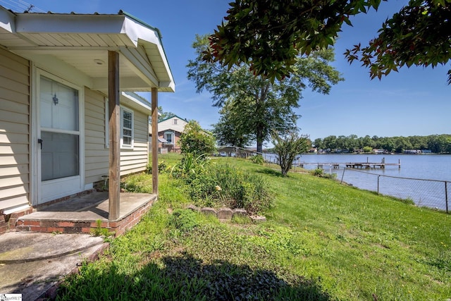 view of yard with a water view