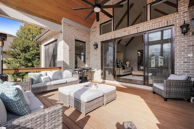 deck featuring ceiling fan, a grill, and outdoor lounge area