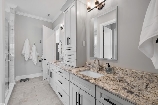 bathroom featuring vanity, tile patterned floors, ornamental molding, and walk in shower