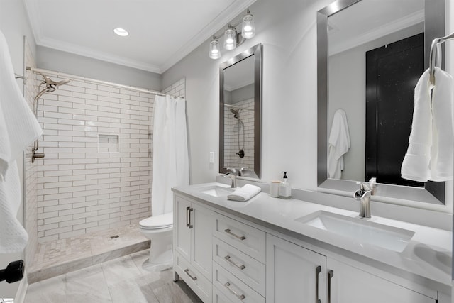 bathroom with ornamental molding, toilet, curtained shower, and vanity