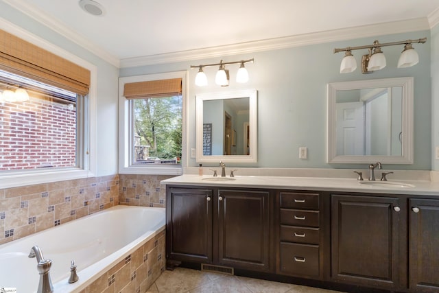 bathroom with vanity, tiled tub, tile patterned flooring, and ornamental molding