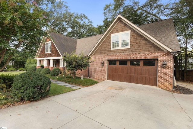 craftsman-style house featuring a garage