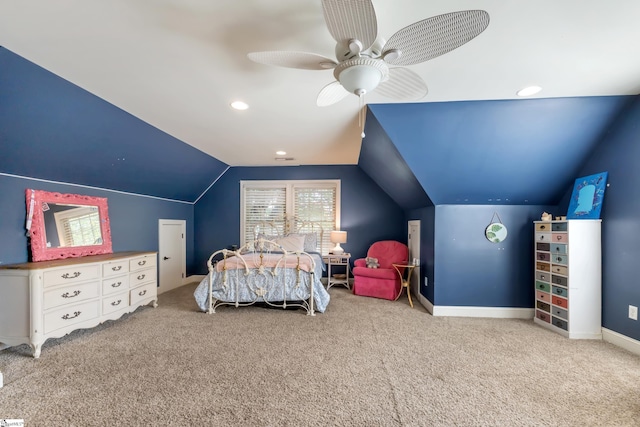 carpeted bedroom with ceiling fan and lofted ceiling