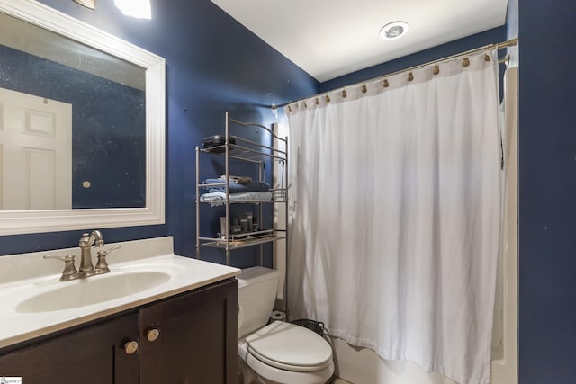 full bathroom with vanity, shower / bathtub combination with curtain, and toilet