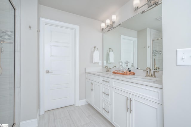 bathroom with vanity and walk in shower