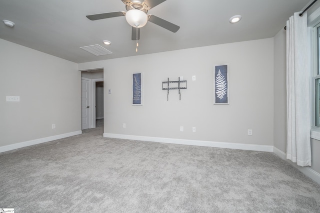 unfurnished bedroom featuring ceiling fan and light colored carpet