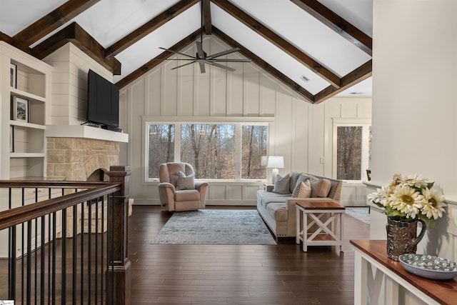 living room featuring beam ceiling, high vaulted ceiling, dark hardwood / wood-style floors, and ceiling fan