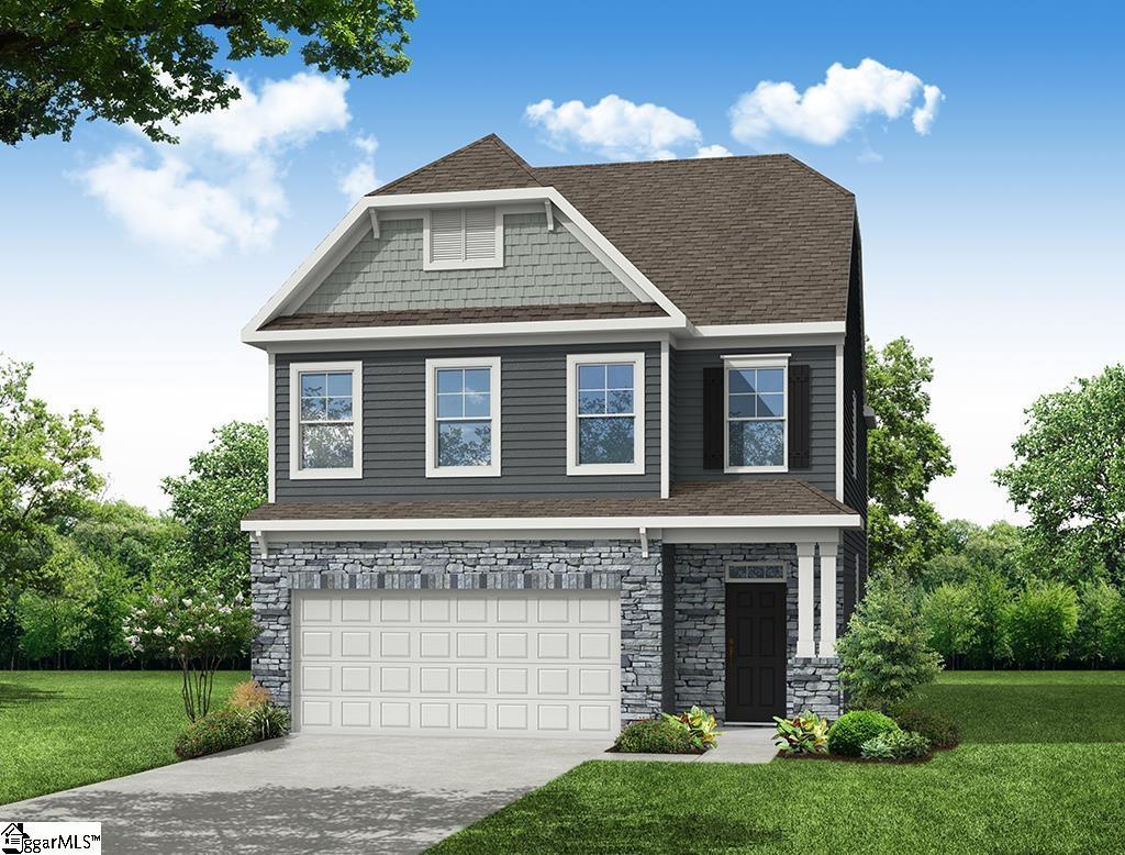 view of front of home featuring a garage and a front yard