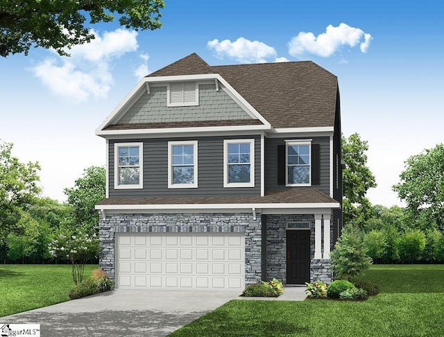 view of front of home featuring a garage and a front yard