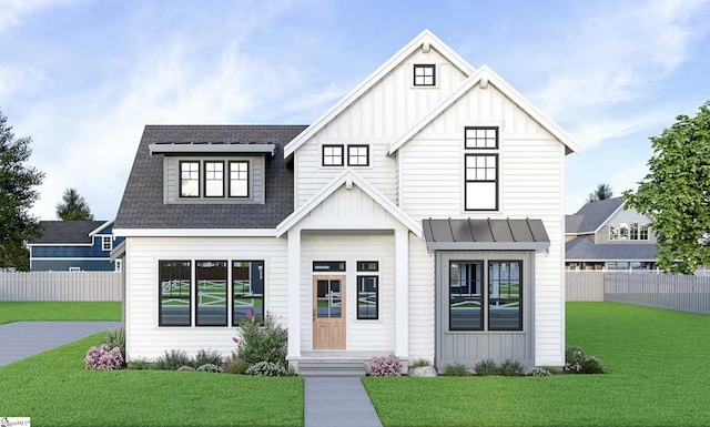 modern inspired farmhouse featuring a front yard