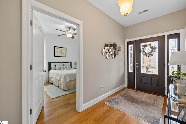 foyer entrance with hardwood / wood-style floors