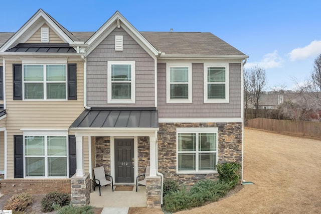 view of front of house featuring a patio area and a front yard