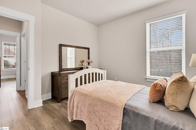 bedroom with hardwood / wood-style flooring