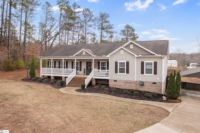 view of front facade with a front yard and a porch