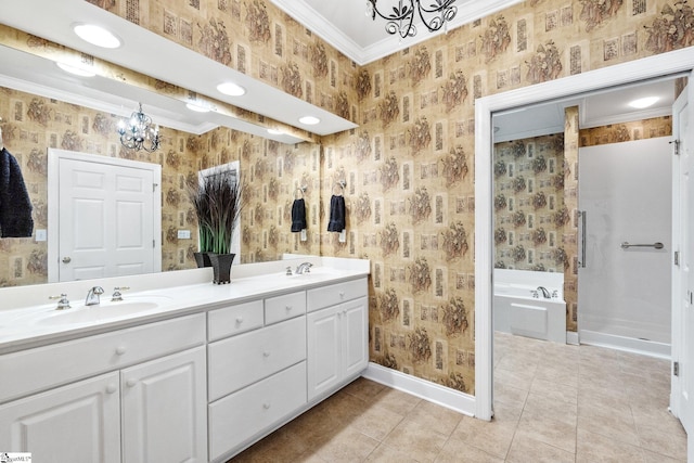 bathroom with a bathtub, ornamental molding, vanity, tile patterned floors, and an inviting chandelier