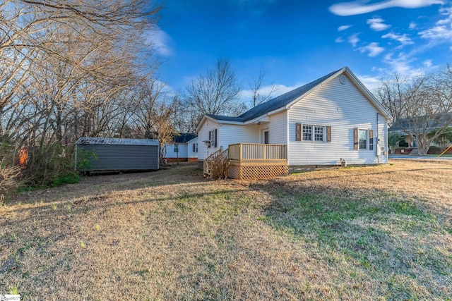 view of property exterior featuring a storage unit and a lawn