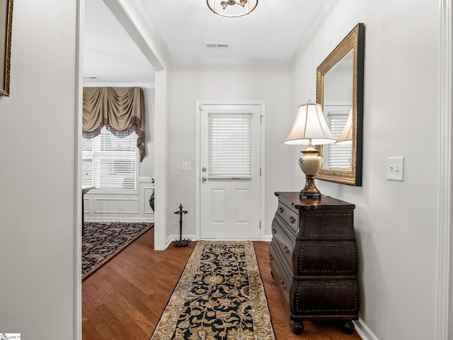 doorway to outside featuring dark hardwood / wood-style flooring