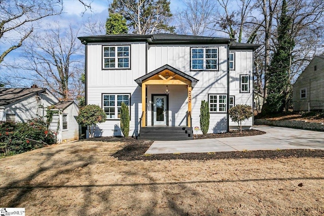 view of front of house with a shed