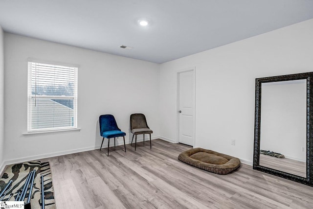 living area featuring light hardwood / wood-style flooring