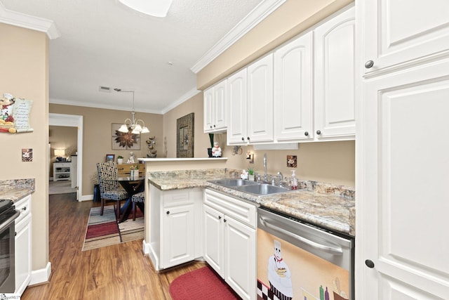 kitchen featuring white cabinetry, sink, crown molding, and appliances with stainless steel finishes