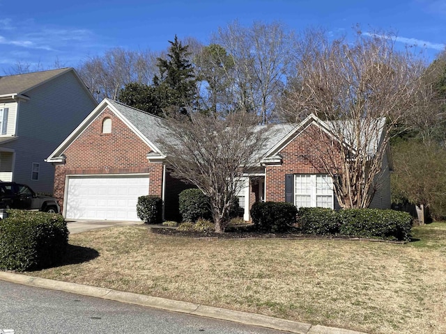 view of front property featuring a garage and a front yard