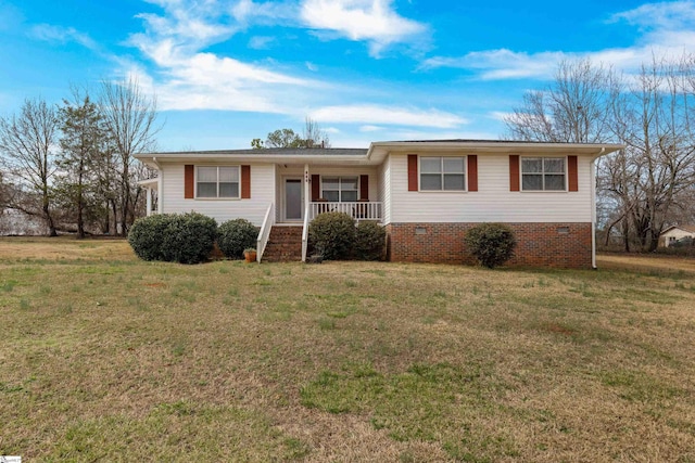 view of front of house featuring a front yard and covered porch