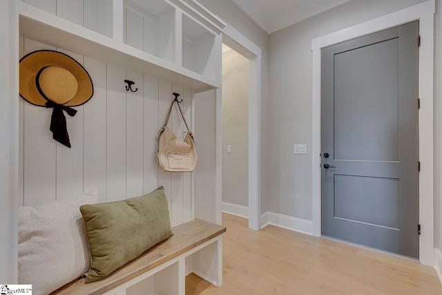 mudroom with hardwood / wood-style flooring