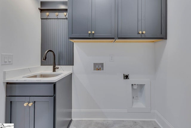 laundry room with cabinets, hookup for a washing machine, sink, and electric dryer hookup