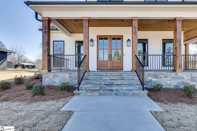 doorway to property with covered porch