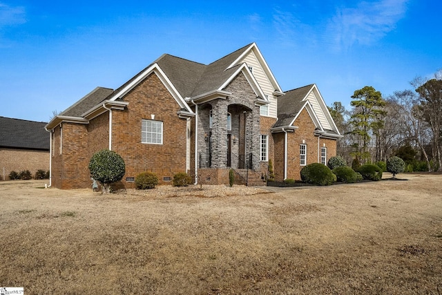 view of front facade featuring a front yard