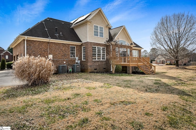 back of house with cooling unit and a wooden deck