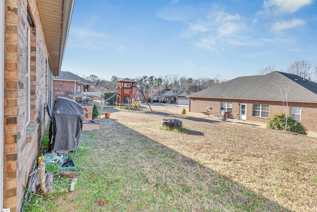 view of yard featuring a playground