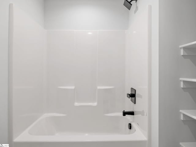 bathroom with shower / bathing tub combination