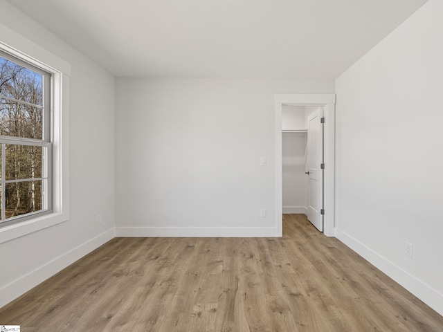 unfurnished room featuring light hardwood / wood-style floors