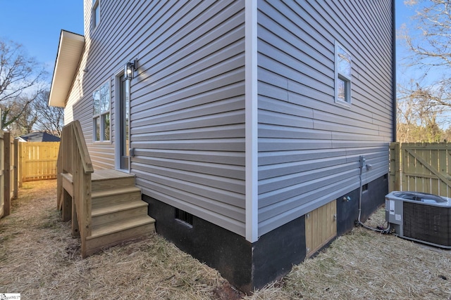 view of side of property featuring cooling unit