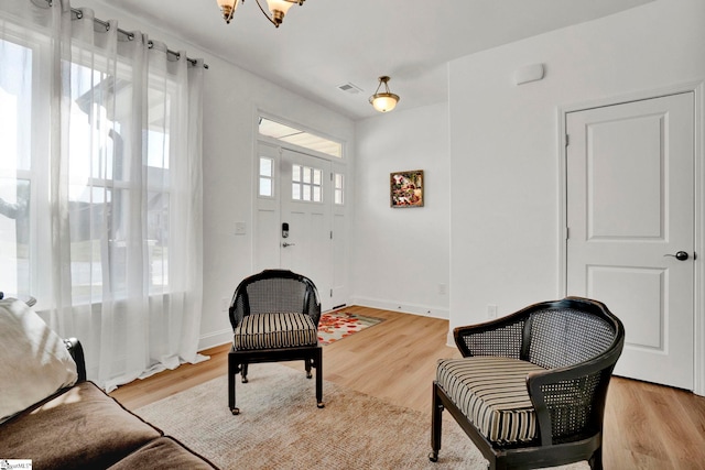 sitting room with light wood-type flooring