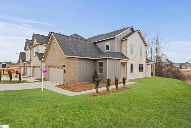 front of property with a garage and a front yard