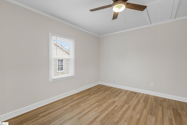 unfurnished room with crown molding, ceiling fan, and light hardwood / wood-style flooring