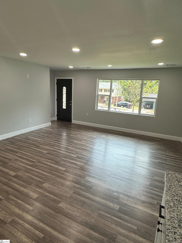 interior space with dark wood-type flooring