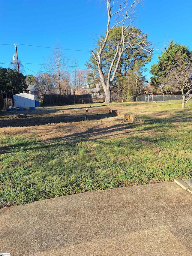 view of yard with fence
