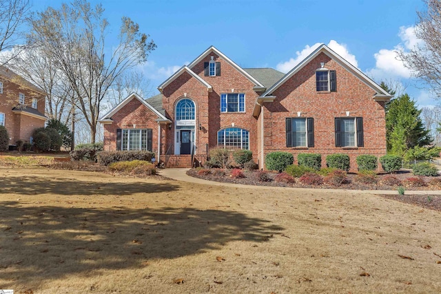 view of front property with a front lawn