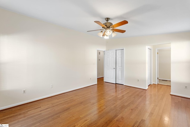 unfurnished bedroom featuring light hardwood / wood-style flooring and ceiling fan