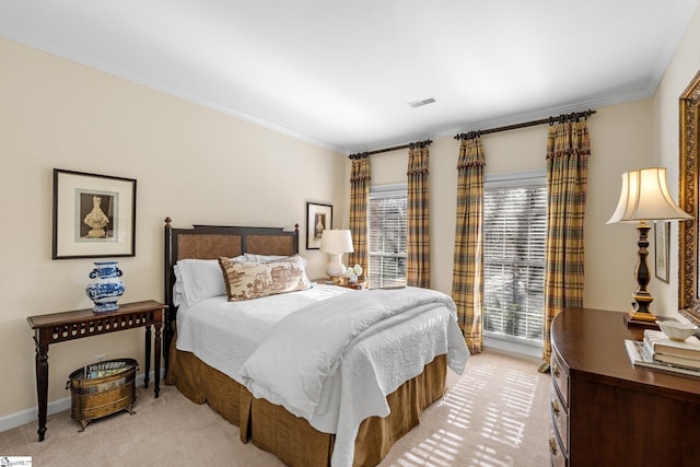 bedroom featuring crown molding and light colored carpet