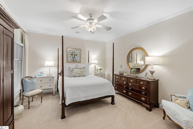 carpeted bedroom featuring crown molding and ceiling fan