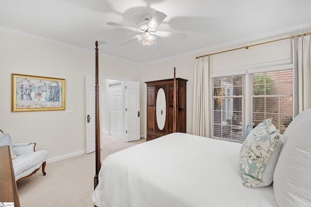 bedroom with crown molding, light colored carpet, and ceiling fan