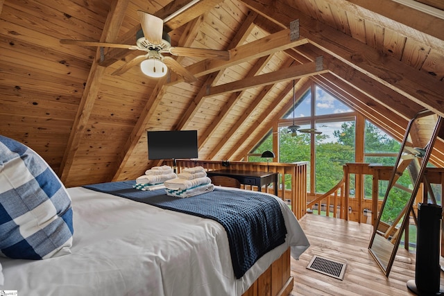 bedroom with access to outside, wooden ceiling, hardwood / wood-style floors, and vaulted ceiling with beams